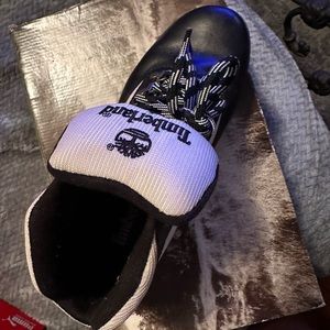 Black and white Timberland boots. Women. Barely worn, original box.